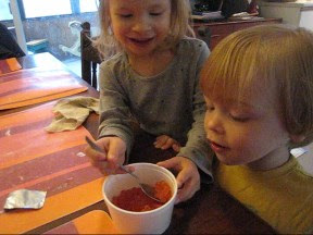 Artemis eating caviar with a spoon